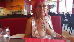 old woman showing off her big chest