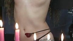 Slave gets restrained with leather cuffs and gets chest spanked with black stick