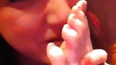 Smelling her feet and flats at work