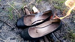 Wife burning her old flats and tights and me stomp on ashes.