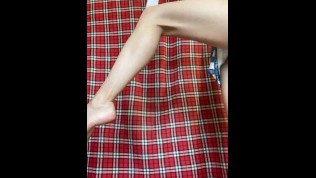 Freshman girl in a cute dress and white knee socks